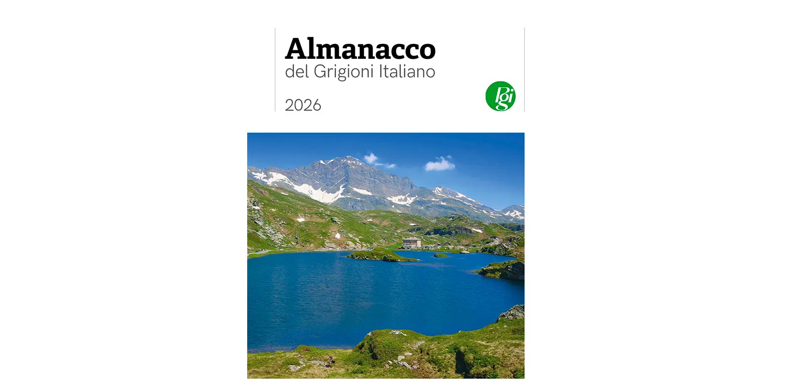 Copertina di un almanacco con una vista di un lago circondato da montagne. Il titolo è "Almanacco del Grigioni Italiano 2026" e include un logo verde.